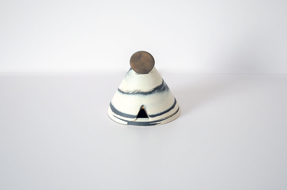 Incense holder with rusty moon on mountain